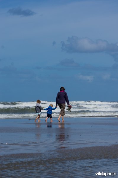 Familie op het strand